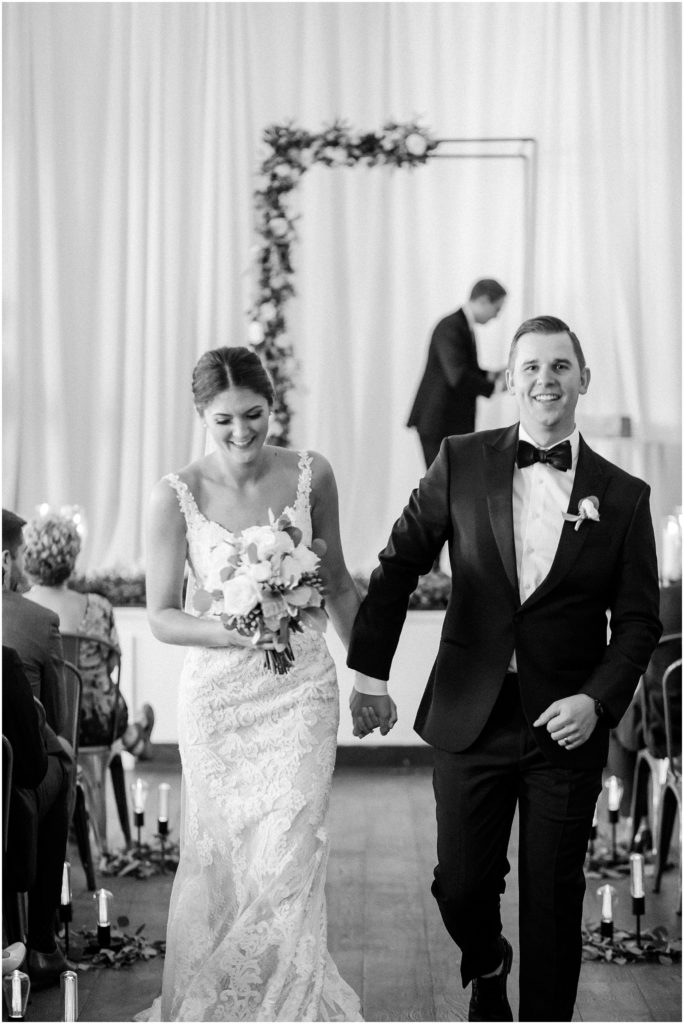 Black and white photo of a wedding ceremony at the Transept OTR in Cincinnati, Ohio