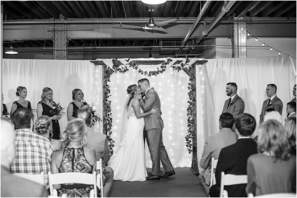 First kiss during a wedding ceremony at Longworth Hall in Cincinnati